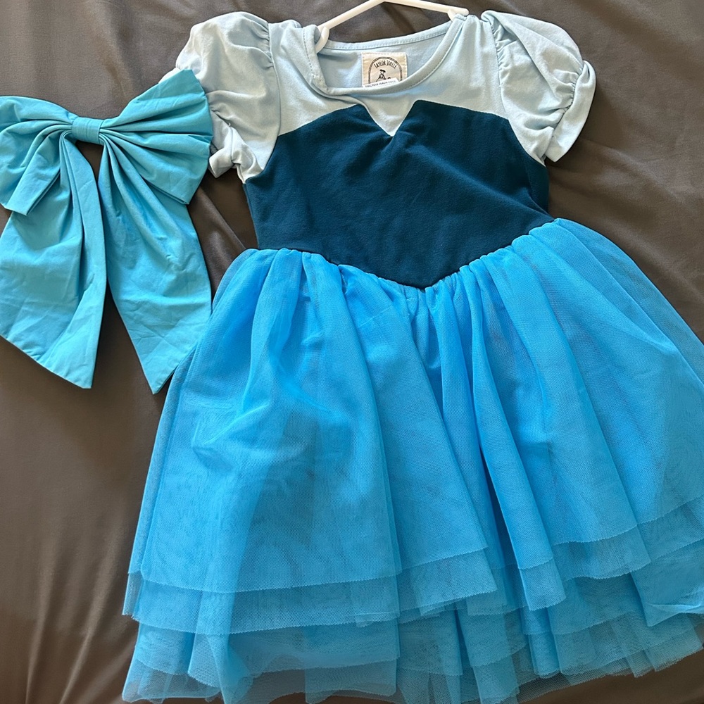 Taylor Joelle Ariel dress with hair bow.